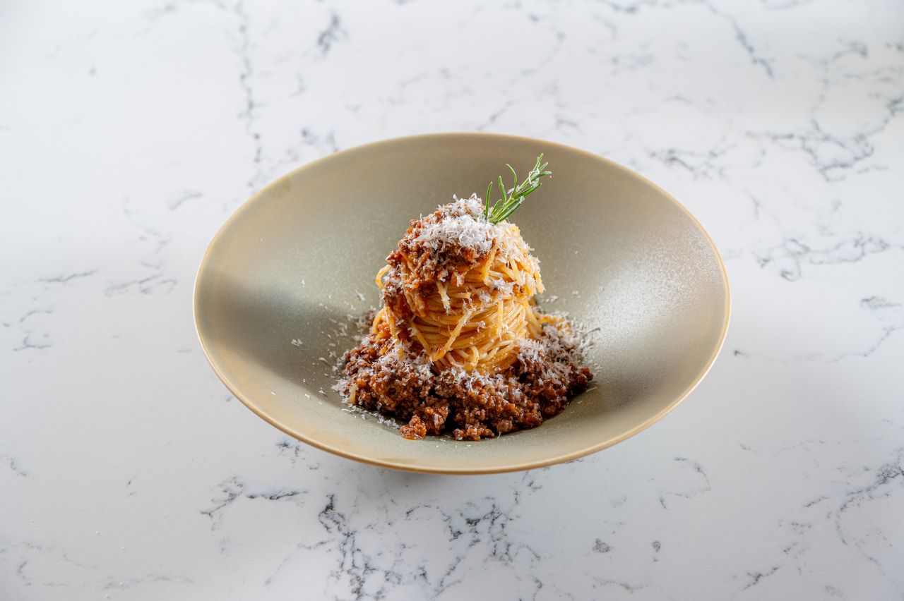 Homemade meat sauce with rosemary