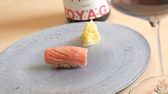 Chef's choice course + wine pairing