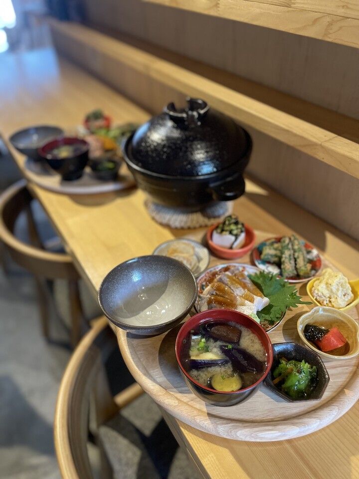 Colorful small dishes and silver rice lunch