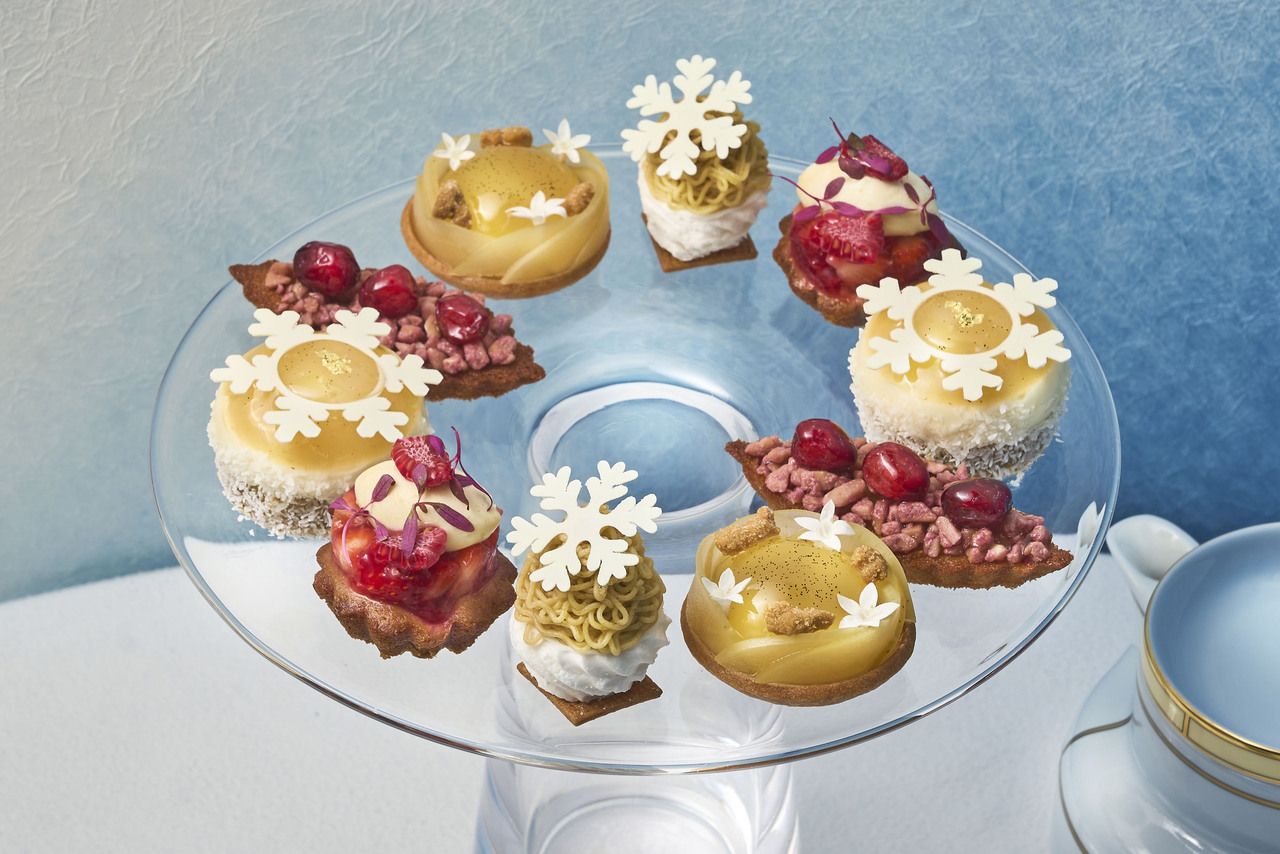 Snow Symphony Afternoon Tea with a glass of champagne