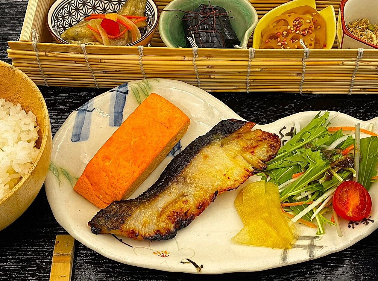 Silver cod Saikyo-style grilled meal (includes rolled egg made with dragon eggs, side dishes, salad, and red miso soup)